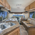 mighty-class-c-large-motorhome-6-berth-interior-front