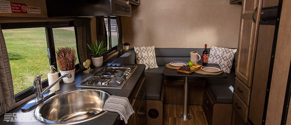 Cruise America Compact Plus RV-kitchen-dining-area