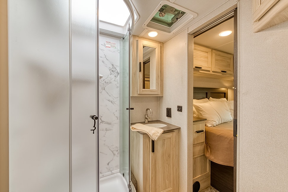 El Monte RV C Family Sleeper-Interior_bathroom_into_bedroom