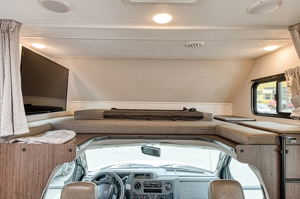 El Monte RV C Family Sleeper-Interior_bed_above_driver