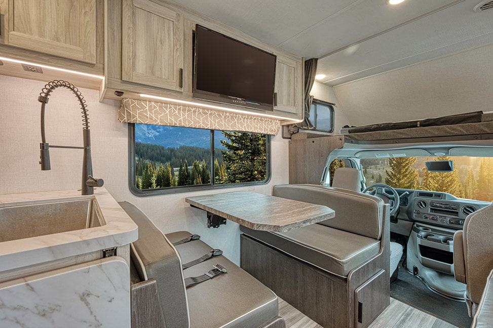 El Monte RV Class C Large-Interior_dining_table_bed