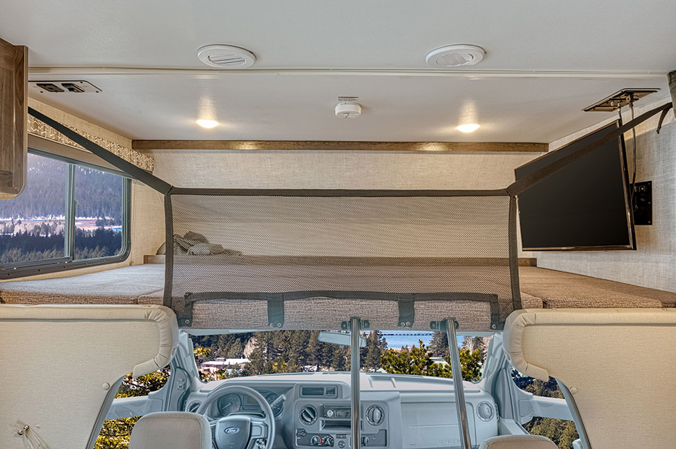 El Monte RV Class C Small-Interior_above_cab_bed_guard