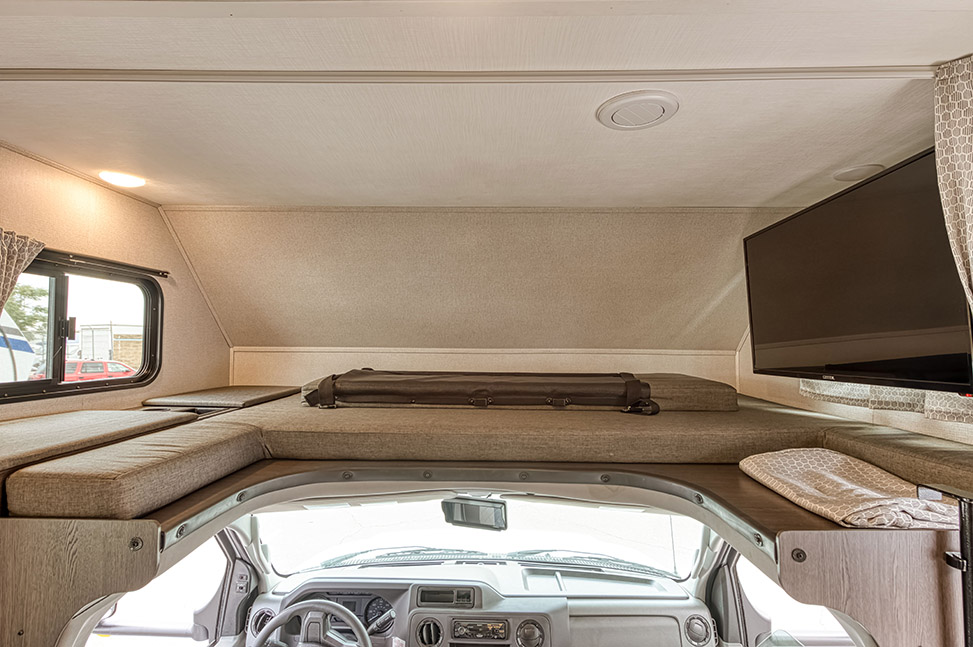 El Monte RV Class C Small-Interior_bed_above_driver