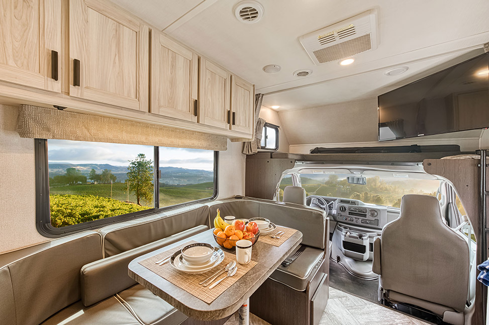 El Monte RV Class C Small-Interior_forward_facing_dining_table