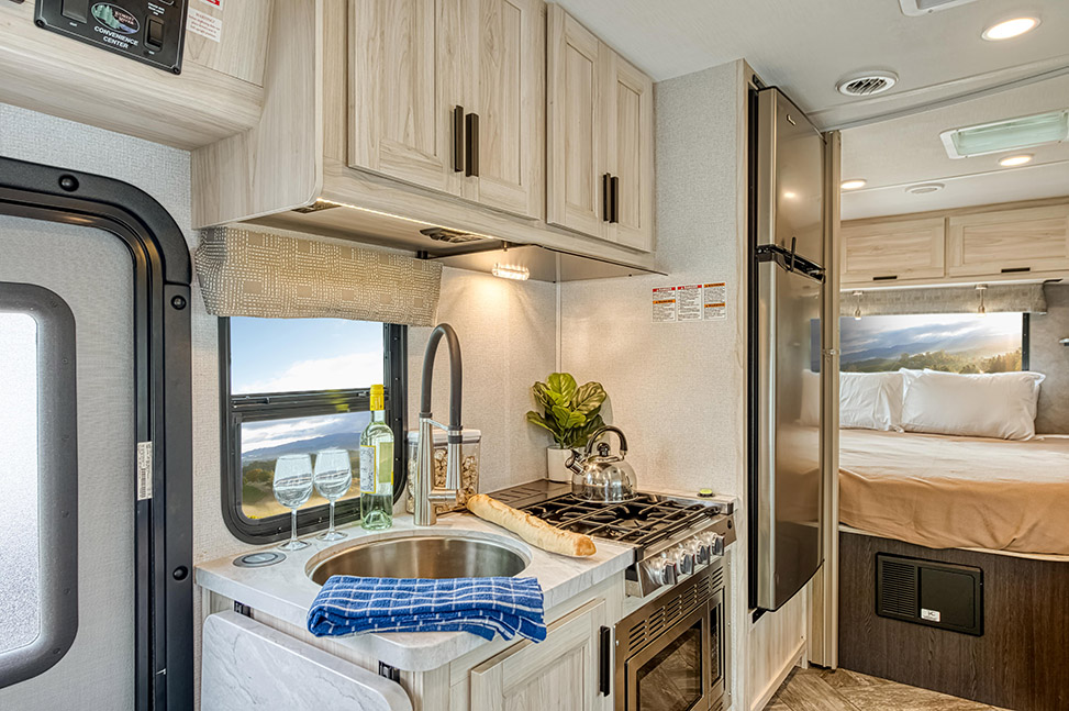 El Monte RV Class C Small-Interior_kitchen_into_bedroom