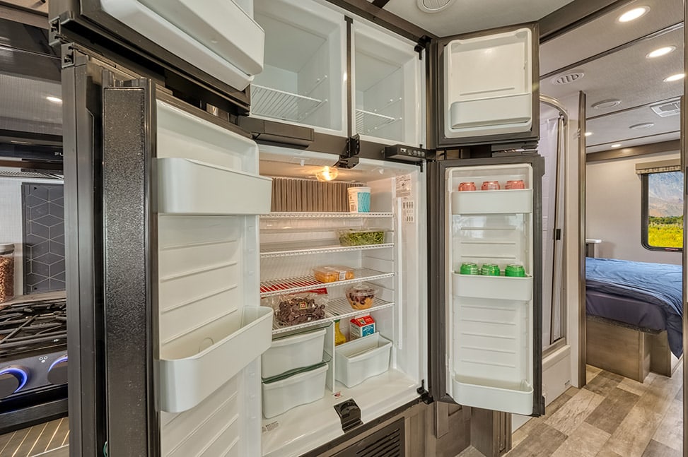 Road Bear RV Class A 30-32' With Slide-Out-Interior_kitchen_fridge_open