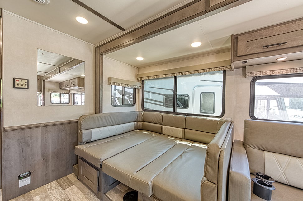 Road Bear RV Class A 30-32' With Slide-Out-Interior_table_into_bed