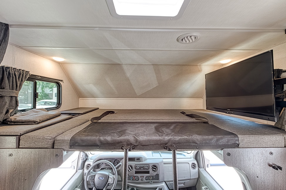 Road Bear RV Class C 29-31' With Slide-Out-Interior_bed_above_driver