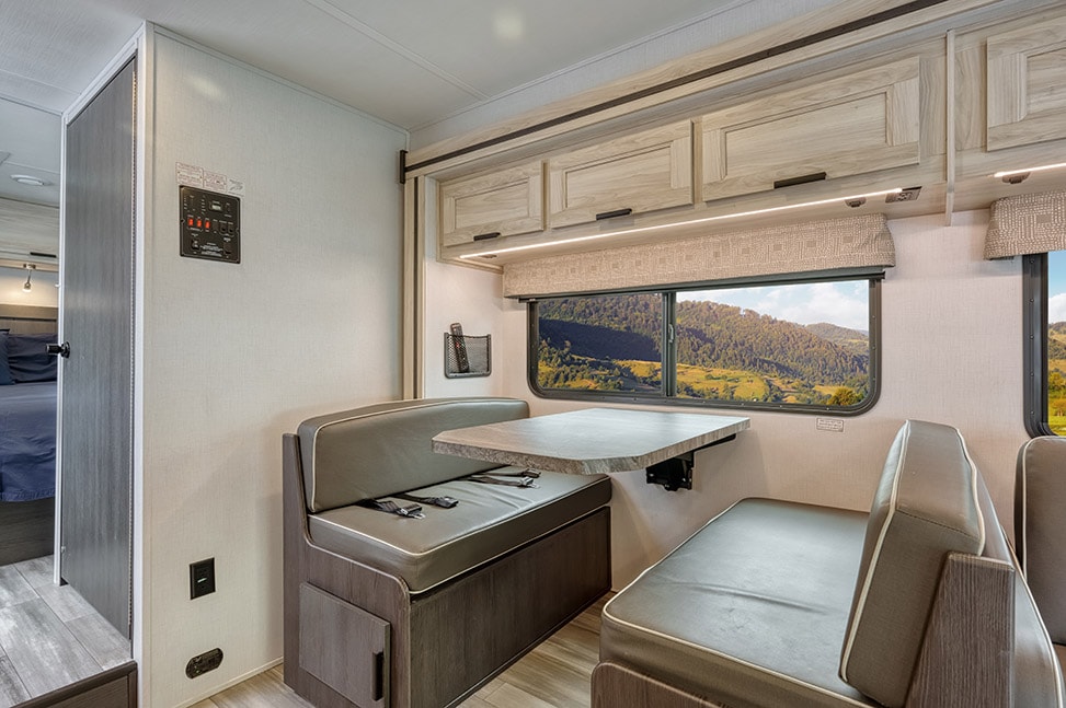 Road Bear RV Class C 29-31' With Slide-Out-Interior_dining_bed_table