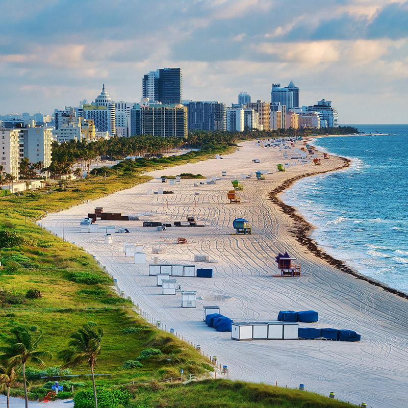 aerial-view-of-city-buildings-beside-the-ocean